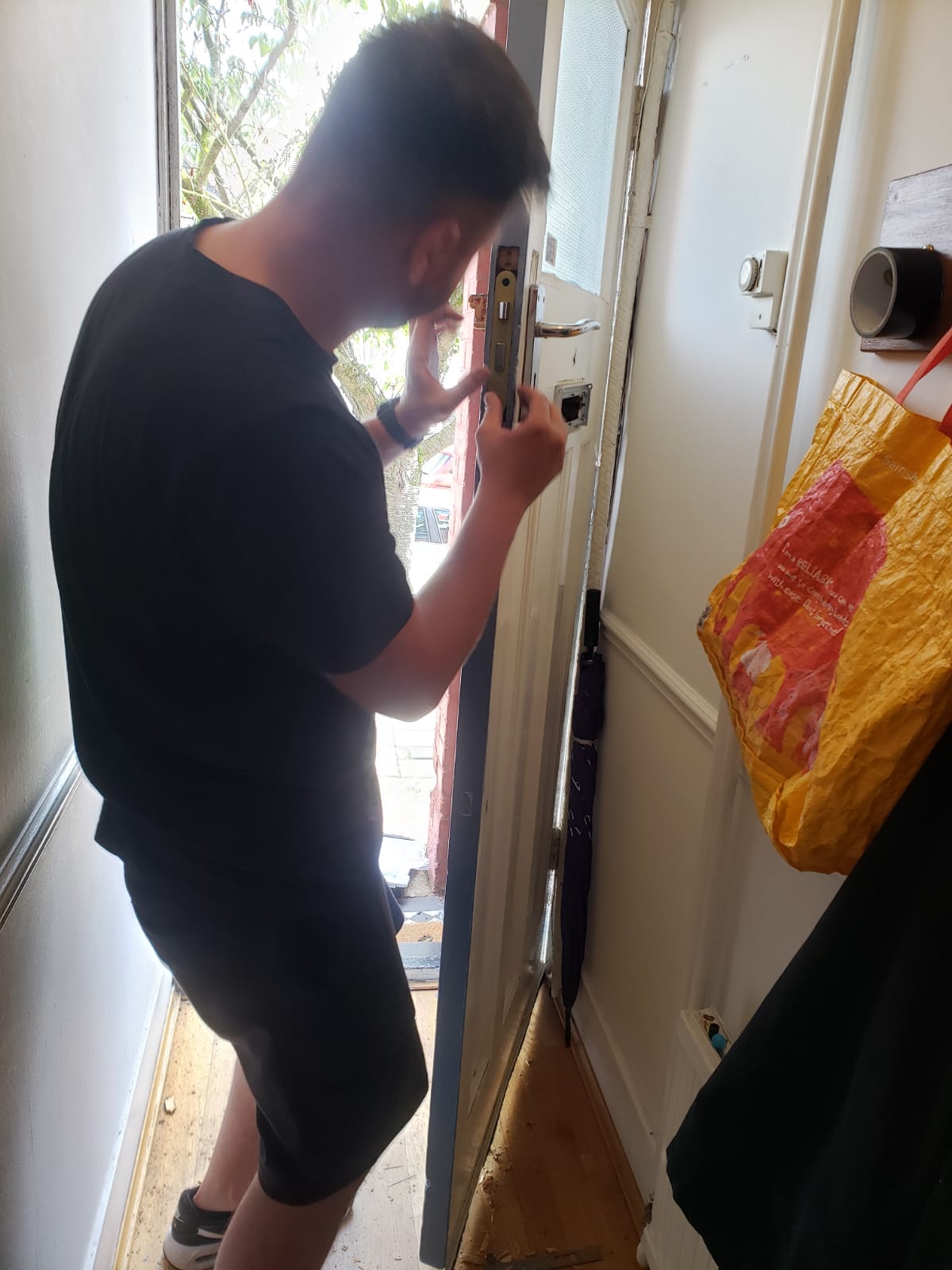 WhatsApp Image 2024-09-15 replacing a deadlock on front door